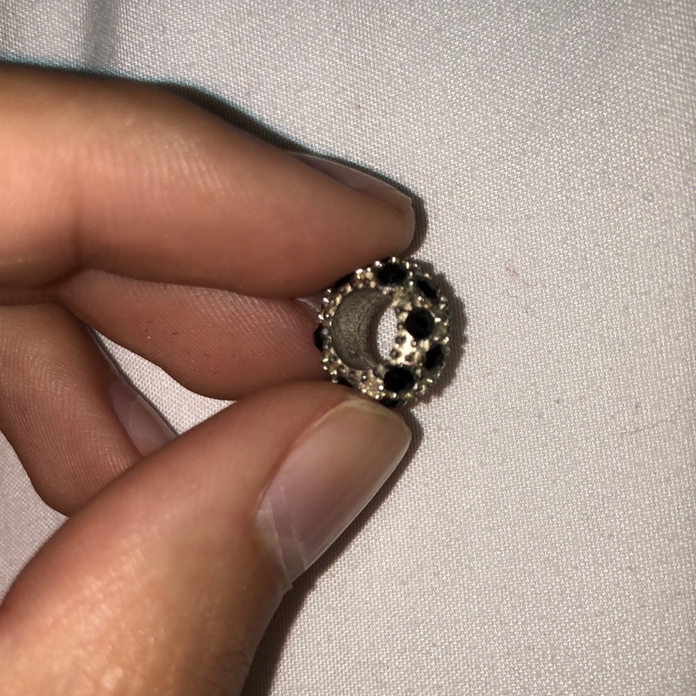 Black and silver pandora charm